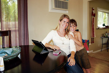 Alison Granato with son Dylan at her home office