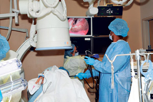 Dr. Yousif A-Rahim (far right) and staff perform an endoscopic procedure on a patient with gastrointestinal bleeding. Nathalie Walker photo