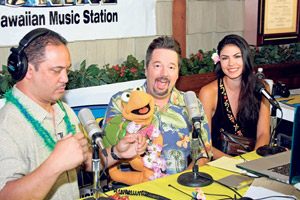 Hawaiian 105 KINEâ€™s Billy V with Terry Fator and Taylor Makakoa during a live broadcast from The Cal