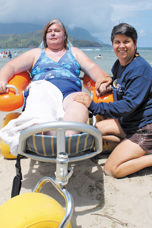 Woolway with stroke victim Karen Batis at a recent KORE outing at Hanalei