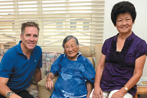 Dr. Bret Flynn with patient Yukie Nishimoto, age 100, and her daughter Kay. Nathalie Walker photo