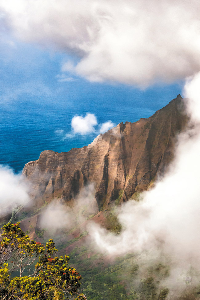 The clouds momentarily part to reveal Kalalau Valley | Daniel Lane photo