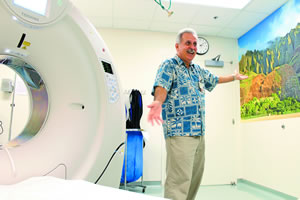 LaPenta shows off one of the new CT scanner acquired by the radiology department recently