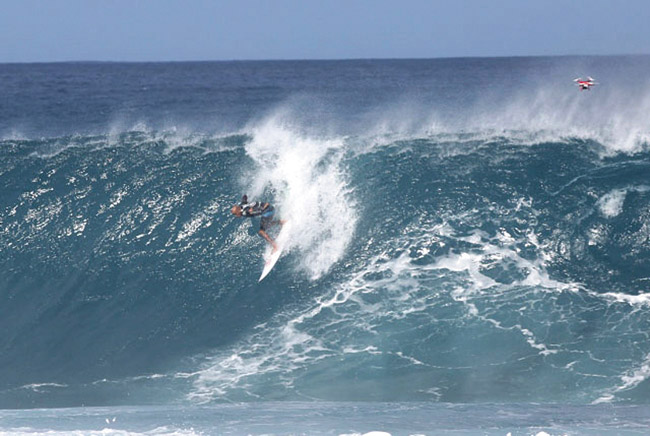 Kelly Slater at Pipeline with a drone hovering nearby | Terry Lilley photos