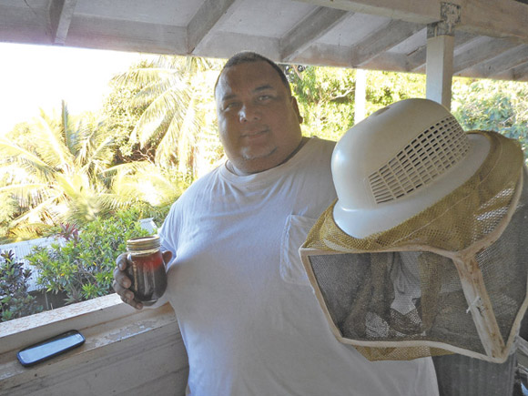 Beekeeper Patrick Coller | Photo courtesy Yukimu Coller