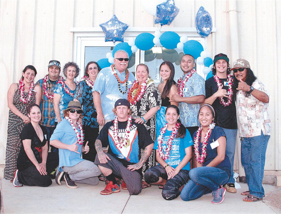 The Salty Wahine family (front, from left): Angela Soto, Kendall Andersland, Aaron Andersland, Brittney Barreira, Paige Ando, (back) Jessika Montoya, Sean Cristobal, Lynne Carvalho, Bernie Rasay, Dave Andersland, Laura Cristobal- Andersland, Nikki Cristobal, Nelson Borja, Shawn Valmoja and Steve Cristobal. Photo courtesy Pang Communications