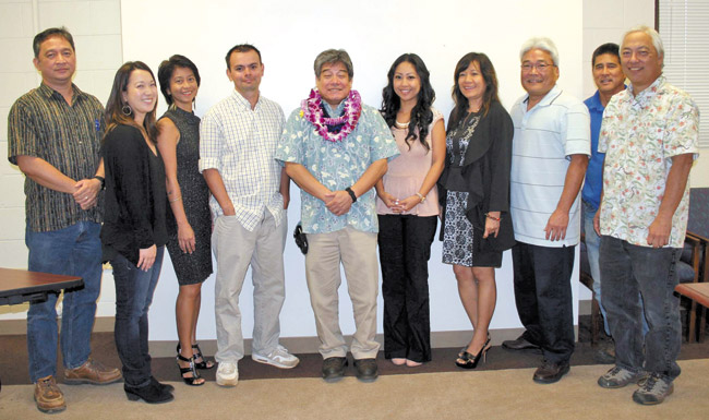 Kirk Saiki, Department of Water's newly appointed manager and chief engineer (in lei), with staff members (from left) Val Reyna, Kim Tamaoka, Debra Peay, Dustin Moises, Saiki, Mary-jane Akuna, Marites Yano, Eddie Doi, Carl Arume and Keith Aoki. Photo from DOW