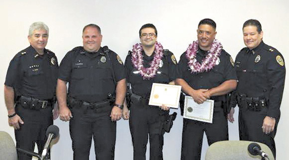 (from left) Assistant chief Roy Asher, officers Aaron Bandmann, Makenzie Metcalfe and Damien Loo, and assistant chief Michael Contrades. Photo from KPD 