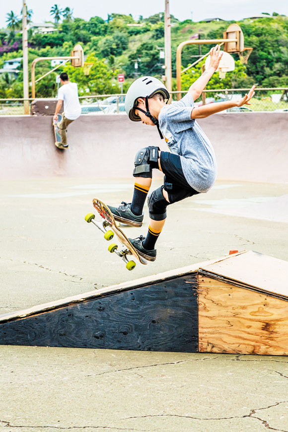 Shayden Mandel works on his ramp skills at the skate park 