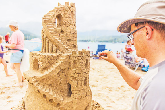 Jeff Peterson, one of the organizers of the event, crafts a spectacularly detailed sand castle during last year's contest 