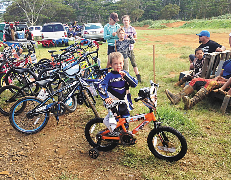 Chase Parkinson (4) was the youngest rider at the GIMC's ‘Hare and Hound/Poker Run' held in May; he also was one of the 21 lucky recipients to receive a bicycle that was donated by generous sponsors for the event. Photo courtesy of Bertram Almeida 