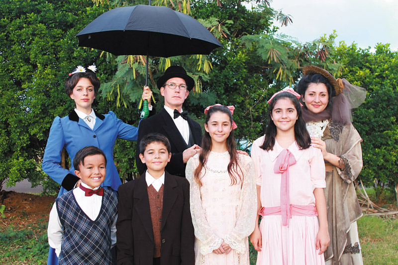 ‘Mary Poppins' cast members (back, from left) Erin Gaines as Mary Poppins, Jim Warrack as George Banks, Jessika Montoya as Winifred Banks, (front) Jeremiah Garcia and Tanner Hubbard, who are double cast as Michael Banks, and Kaile McKeown and Mia Thompson, who are double cast as Jane Banks