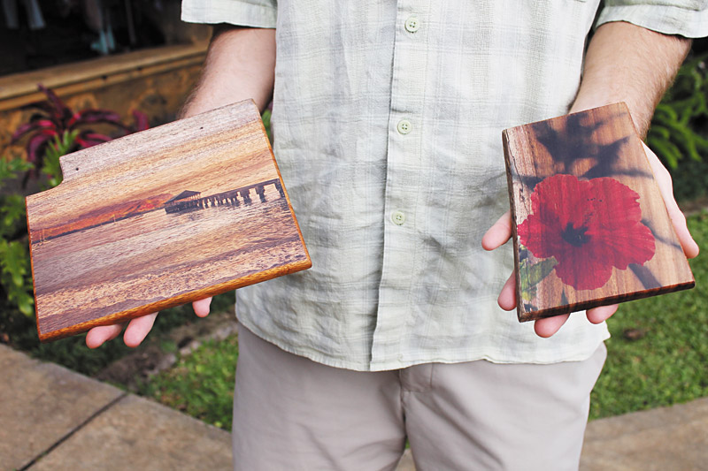 Abe Kowitz of Kauai Wood Photography shows off some of his artwork, where he puts iconic Hawaii images onto reclaimed wood; 