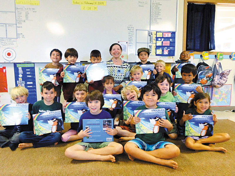 Susan Dierker visits a classroom for Read Across Kauai Day in 2014 