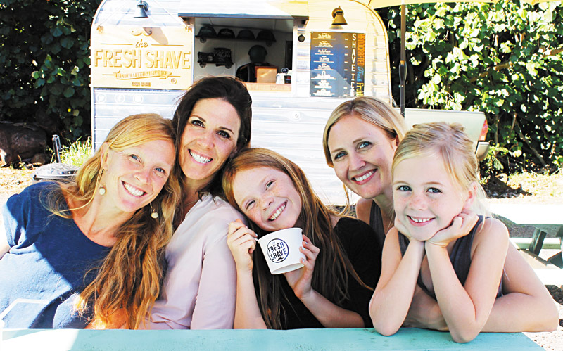 The Fresh Shave is one of the food trucks that regularly makes an appearance at Warehouse 3540. From left: Ariana Owen, Leah Brown, and Niah, Rebecca and Ivy Owen. 