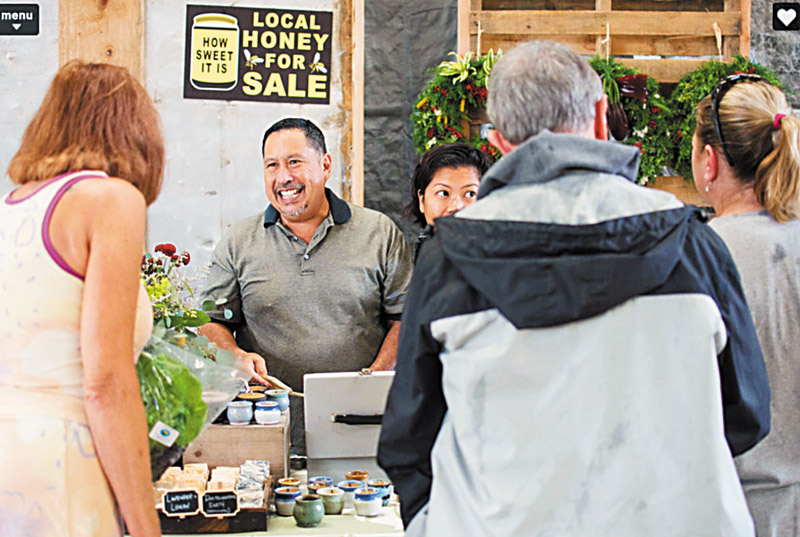 Vendors at Warehouse 3540's Friday Market sell local products, such as honey (Photo courtesy Warehouse 3540) 
