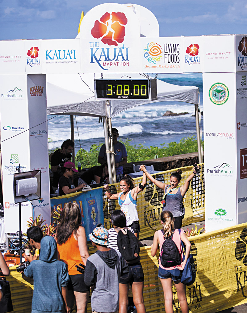 A sense of accomplishment washes over participants who cross the finish line at the Kauai Marathon and Half Marathon, no matter what their time is 