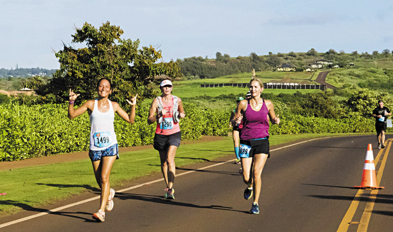 Runners traverse the Kauai Marathon course — No. 1499 is Randi Keipper of Kapaa 