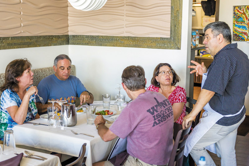 Jean-Marie Josselin, JO2 executive chef, chats with Tasting Kauai patrons during a private food sampling Marta Lane's laugh is infectious. That's one of many reasons sharing a meal with her is good fun — that, and soaking in her well-rounded knowledge about local food. 