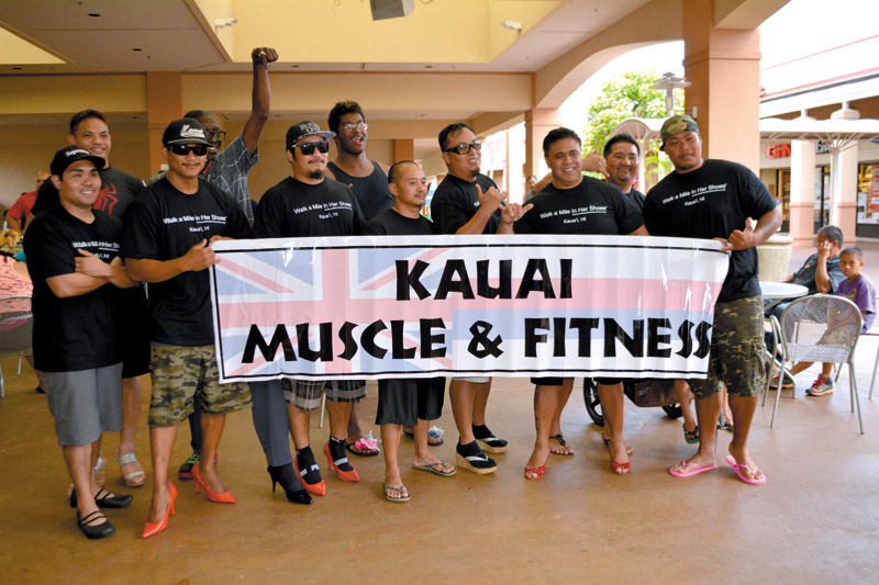Kauai Muscle and Fitness representatives ‘Walk a Mile in Her Shoes.' They are among a larger group of men who participate every year in a ‘March Against Violence' that demonstrates their commitment to eliminating domestic violence and sexual assault