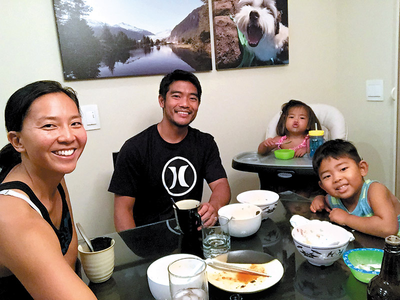 The Millard ohana enjoys a meal at home: Erin, Daren, Lily and Levi 