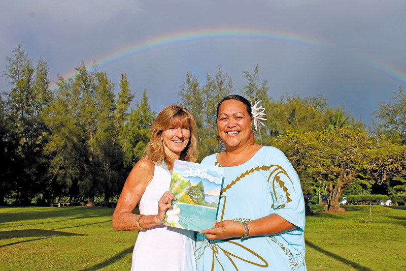 Ann Hettinger (left) and Lahela Keikila‘au‘o‘wakanahele Chandler Correa with their new book, ‘Aloha' COCO ZICKOS PHOTO 