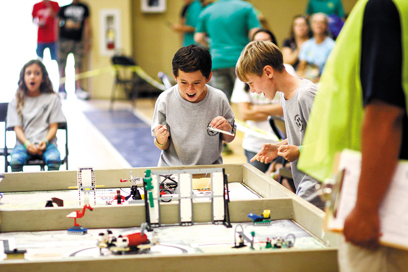 Island School fifth-graders Titus Schweitzer and Kai Spinet at the FIRST Lego League, elementary division (grades 3-5). Their team is called Robotic Voyagers 