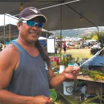 Jonathon Olores demonstrates the intricacies of fishnet weaving