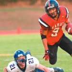 Darren Acoba breaks off another big gain on the way to rushing for 158 yards