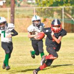 Lanakila Wilson (1) breaks away