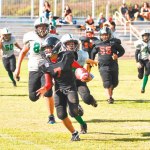 Damien Butac (7) eyes the end zone