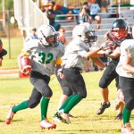 Boogie Yam (32) starts his long touchdown run
