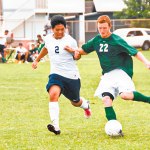 Kapa‘aâ€™s Brycen Phillis works against Waimeaâ€™s Camden Nakashima