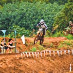 Jeff Skinner in the 125cc amateur class as Kim Bunao, Jenna GomesFu and Sherri Medeiros keep score