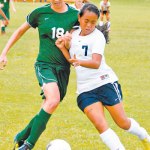 Waimeaâ€™s Kayhla Cochero-Ramos executes a textbook shoulder charge on Hinkel