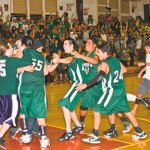 Kapa‘a celebrates after Spam Lindseyâ€™s (55) game-winning layup to clinch the K.I.F. title