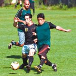 Kryptoniteâ€™s Daniel Minei battles Cory Rita for the loose ball