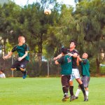 Afterburnerâ€™s Eli Emory goes for the header between Daniel Minei and Randal Toki.