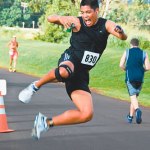 David Tamayo clicks his heels in excitement while enjoying a water break.