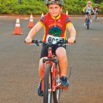 Barth Colby pedals hard toward the finish line.