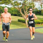 Leo McCarthy and Yolanda Portugal-Cabral run in stride.