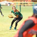 Shortstop Lerae Ho‘opi winds up to throw out an ‘Iolani baserunner