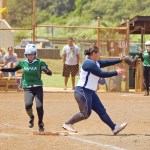 Kapa‘aâ€™s Melinda Obar is ruled safe, making it to the bag just as the ball arrives.