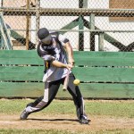 A F.O.C.U.S. batter shows perfect form as he connects with a pitch