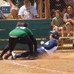 Kapa‘a pitcher Ta‘asha Napolean drops a tag on Waimeaâ€™s Davelynn Tafiti.