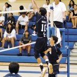Kalen McCracken goes high for the block