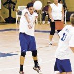 Sam Dunham digs the ball while attempting to set up a teammate