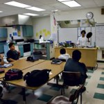 Kay Holt discusses a recipe with Holomua students at Kapa‘a Middle School