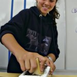 Asianna shreds Parmesan