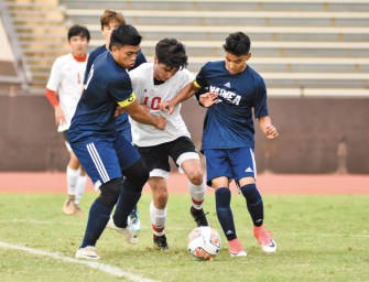 Menehune Boys Edge Past Red Raiders